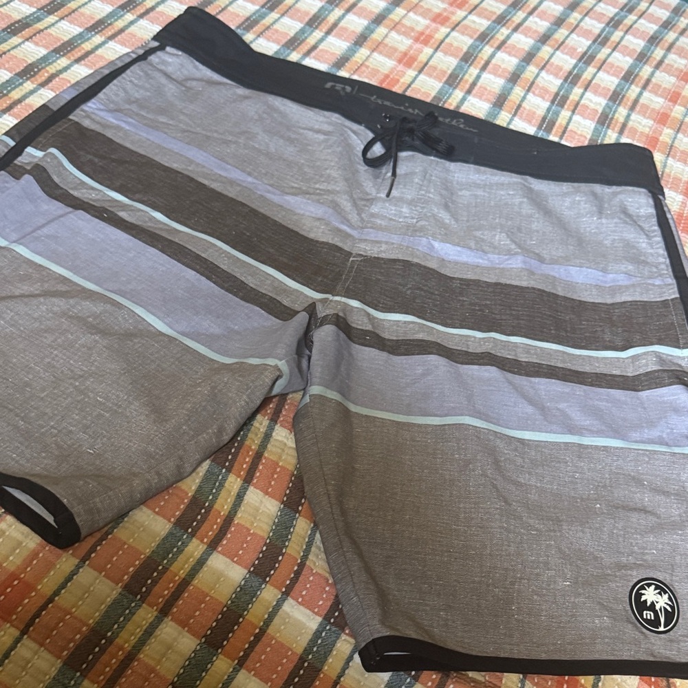Travis Mathew’s Gray Striped Swim Trunks - Palm Logo